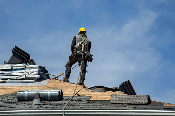Professional Storm Damage Roof Repair technician working in Lincoln, MA